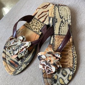 Woman’s size 5.5 animal print flower sandals